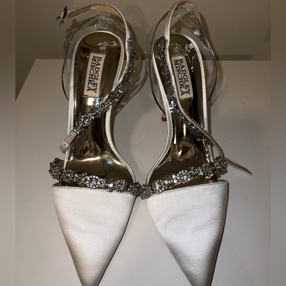 Never worn, white satin with PVC ankle strap and jewel strap